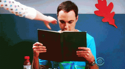 funny-big-bang-theory-sheldon-reads-comic-book-animated-gif.gif